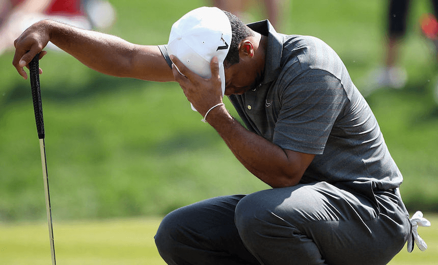 Tiger Woods looks dejected during the third round of The Abu Dhabi HSBC Golf Championship on January 28, 2012 in Abu Dhabi, United Arab Emirates. 
