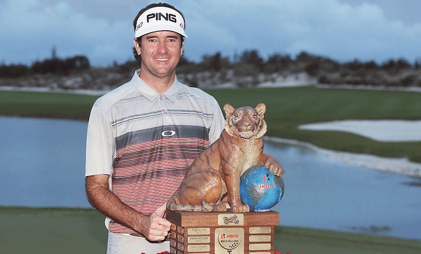 Bubba Watson of the United States poses with the trophy after his three-stroke victory at the Hero World Challenge in the Bahamas  (Photo by Scott Halleran/Getty Images)