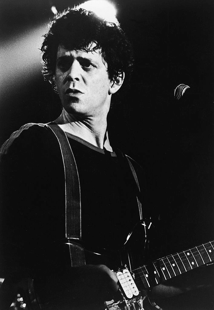 Portrait of American rock and roll musician Lou Reed on stage with a guitar, 1970s. (Photo by Hulton Archive/Getty Images)