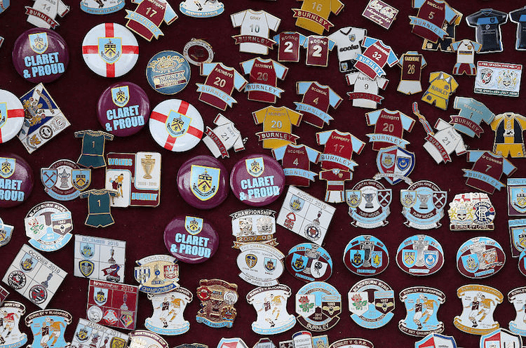 A fine selection of Burnley badges. (Photo: Getty Images)