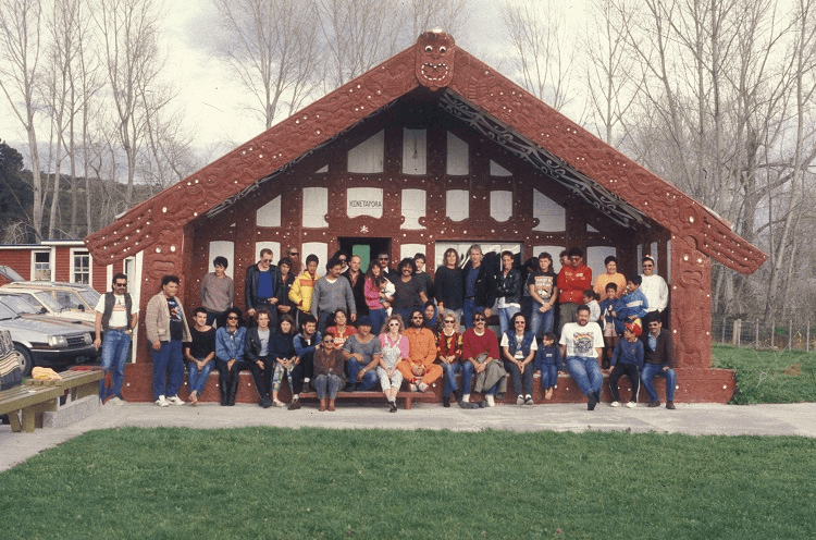 HERBS AND FRIENDS AT THE MANGAHANEA MARAE (MANAGER HUGH LYNN IN AMAZING ORANGE BOILSERSUIT)