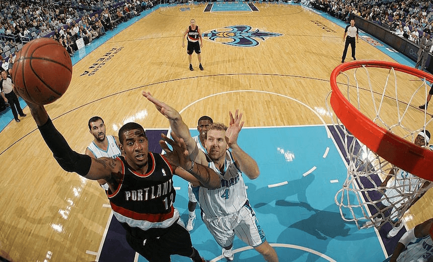 NEW ORLEANS – NOVEMBER 13: LaMarcus Aldridge #12 of the Portland Trail Blazers shoots the ball over Sean Marks #4 of the New Orleans Hornets at the New Orleans Arena on November 13, 2009 in New Orleans, Louisiana. NOTE TO USER: User expressly acknowledges and agrees that, by downloading and/or using this Photograph, User is consenting to the terms and conditions of the Getty Images License Agreement. (Photo by Chris Graythen/Getty Images)