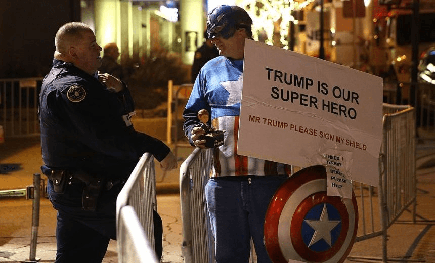 MILWAUKEE, WI – NOVEMBER 10:  A supporter of republican presidential candidate Donald Trump wears a Captain America outfit outside of the Republican Presidential Debate sponsored by Fox Business and the Wall Street Journal at the Milwaukee Theatre on November 10, 2015 in Milwaukee, Wisconsin.   (Photo by Justin Sullivan/Getty Images) 
