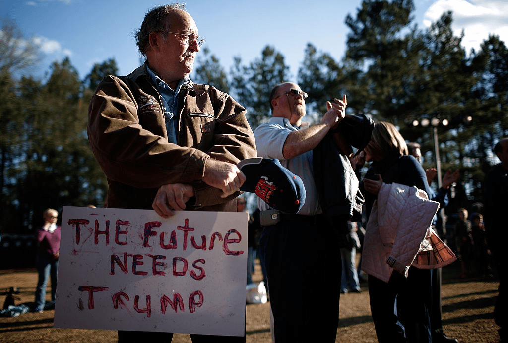 WALTERBORO, SC - FEBRUARY 17:  Audience members wait to hear Republican presidential candidate Donald Trump deliver remarks on February 17, 2016 in Walterboro, South Carolina. Trump addressed the Lowcountry Sportsmen for Trump with three days remaining before the South Carolina Republican primary.  (Photo by Win McNamee/Getty Images)