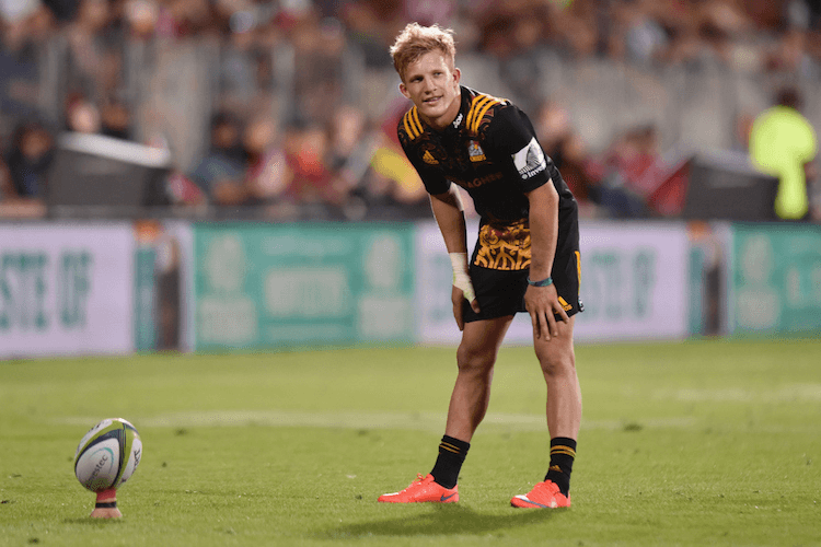 CHRISTCHURCH, NEW ZEALAND - FEBRUARY 27: Damian McKenzie of the Chiefs looks to kick the ball during the round one Super Rugby match between the Crusaders and the Chiefs at AMI Stadium on February 27, 2016 in Christchurch, New Zealand.  (Photo by Kai Schwoerer/Getty Images)