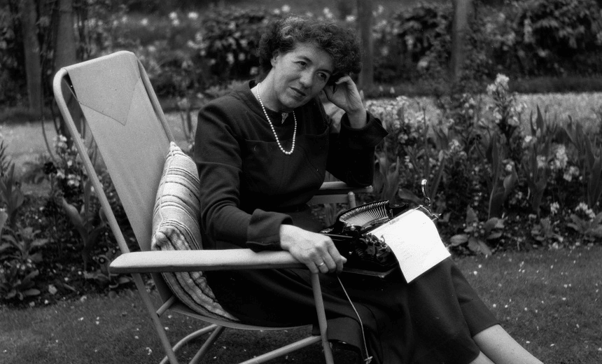 Children’s writer Enid Blyton (1897 – 1968) sitting in her garden in Beaconsfield, Buckinghamshire.   (Photo by George Konig/Getty Images) 
