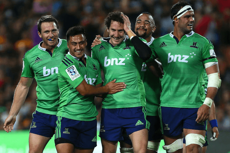 Highlanders teammates gather around the talismanic Marty Banks for good luck.  (Photo by Simon Watts/Getty Images)