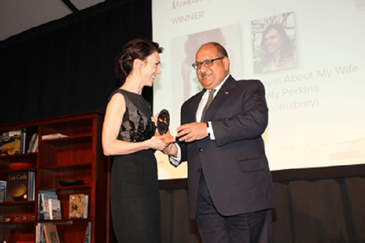 EMILY PERKINS, WINNER OF THE 2009 BOOK AWARD FOR NOVEL OF THE YEAR, MODELS A LITTLE BLACK  COCKTAIL DRESS HER PUBLISHER FOUND IN A VINTAGE STORE 