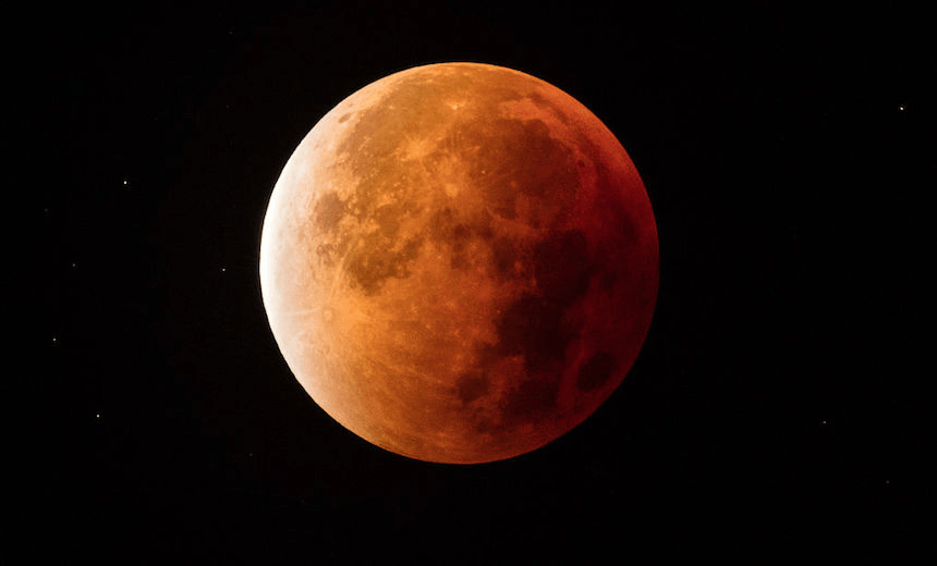 GLASTONBURY, UNITED KINGDOM – SEPTEMBER 28:  The full eclipse of the moon ends as the moon leaves the shadow of the Earth on September 28, 2015 in Glastonbury, England. Tonight’s supermoon – so called because it is the closest full moon to the Earth this year – is particularly rare as it coincides with a lunar eclipse, a combination that has not happened since 1982 and won’t happen again until 2033.  (Photo by Matt Cardy/Getty Images) 

