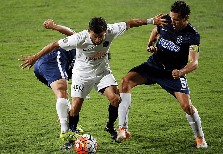 Current NZFC format, with Team Wellington's Luis Corrales (C) competes with Auckland City's Takuya Iwata (L) and Angel Berlanga (R) during the ASB Premiership Grand Final match between Auckland City FC and Team Wellington at QBE Stadium on March 10, 2016 in Auckland, New Zealand. (Photo by Michael Bradley/Getty Images)