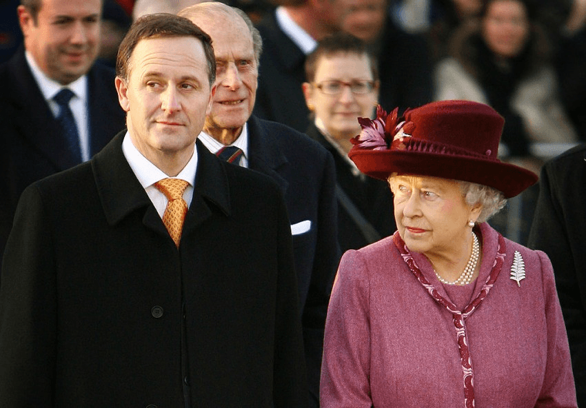 LONDON - NOVEMBER 25:  Queen Elizabeth II looks at New Zealand Prime Minister John Key on November 25, 2008 in London. The Queen visited a New Zealand tourism exhibition housed in a giant inflatable rugby ball near London's Tower Bridge.  (Photo by Peter Macdiarmid/Getty Images)