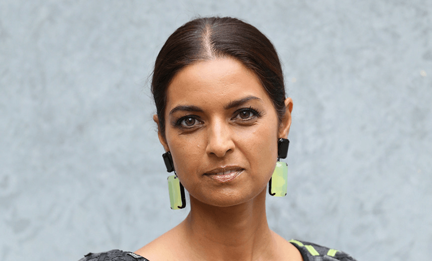MILAN, ITALY – SEPTEMBER 20:  Jhumpa Lahiri attends the Giorgio Armani  Show as part of Milan Fashion Week Womenswear Spring/Summer 2015 on September 20, 2014 in Milan, Italy.  (Photo by Vittorio Zunino Celotto/Getty Images) 
