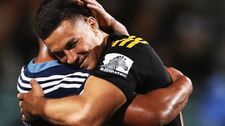 In a moment foreshadowing today's announcement, Sonny Bill Williams tenderly hugs a Blues player. (Photo: Getty Images)