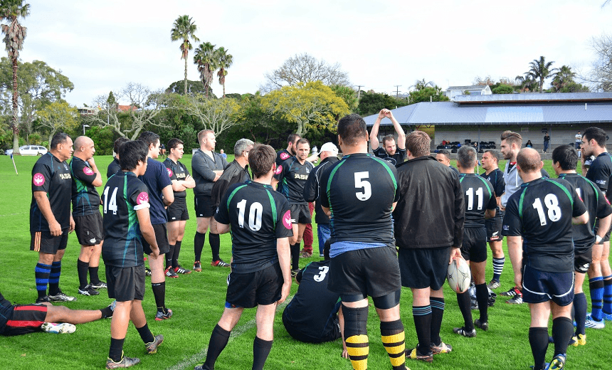 JEREMY, FACING CAMERA, AND THE NZ FALCONS PREPARE FOR A GAME. PHOTO: SUPPLIED