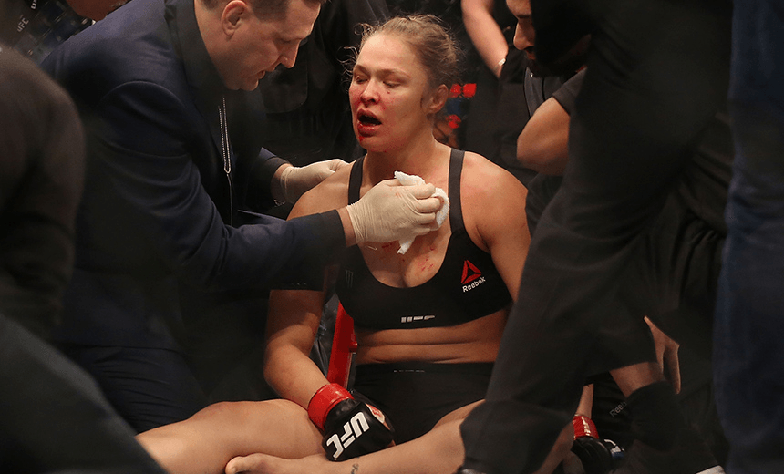 MELBOURNE, AUSTRALIA – NOVEMBER 15: Ronda Rousey of the United States receives medical treatment after being defeated by Holly Holm of the United States in their UFC women’s bantamweight championship bout during the UFC 193 event at Etihad Stadium on November 15, 2015 in Melbourne, Australia. (Photo by Quinn Rooney/Getty Images)