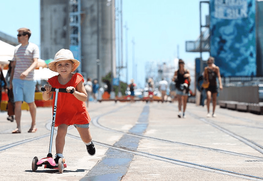 Lola Palmer-Blandford, 4 of Kohimarama rides her scooter in Auckland’s Wynyard Quarter, January 2014. Photo: Getty Images 

