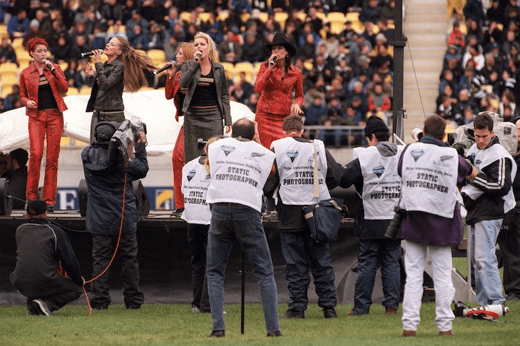 Photographers flock to capture an iconic moment in trans-Tasman singing. (Photo by Phil Walter/Getty Images)