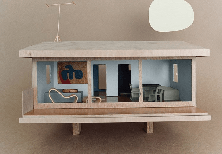 Karen's tiny house painted with a tiny brush and tiny pots of tiny paint