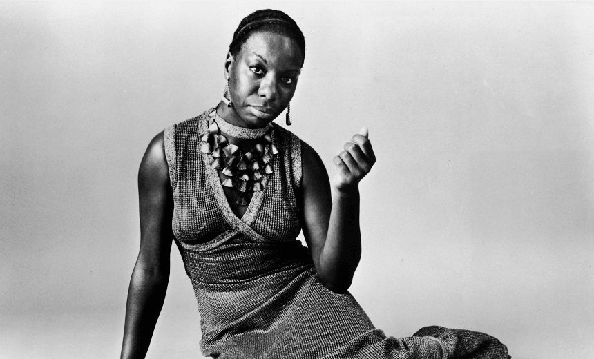 UNSPECIFIED – 1968: This studio portrait shows American pianist and jazz singer Nina Simone reclining on the floor circa 1968. Simone, whose deep, raspy voice made her a unique jazz figure and later helped chronicle the civil rights movement, died in her sleep on April 21, 2003 of natural causes after a long illness. She was 70.   (Photo by Getty Images) 

