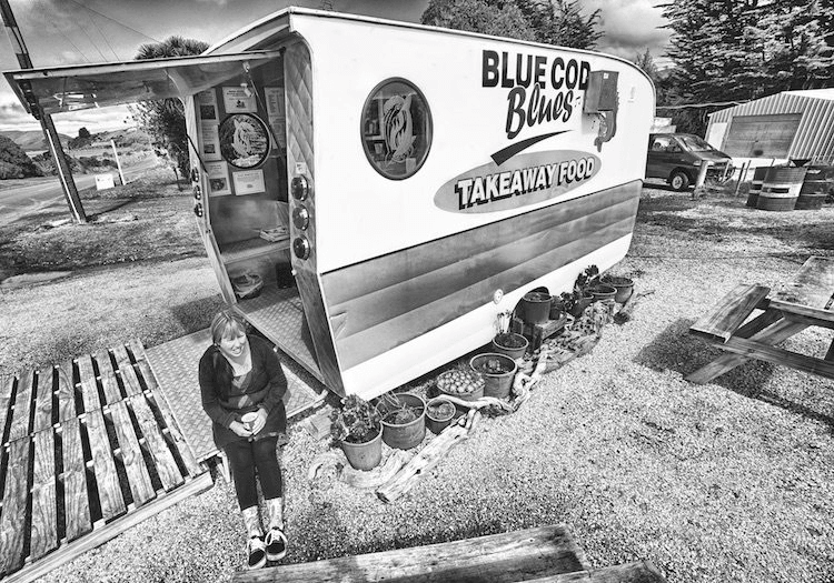 Kerri with her caravan (Image: Otago University Press)