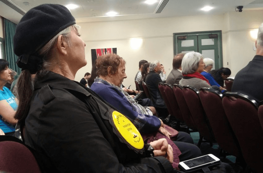 Mayoral candidate Penny Bright sits in on a meeting on glyphosate in the Auckland town hall.
