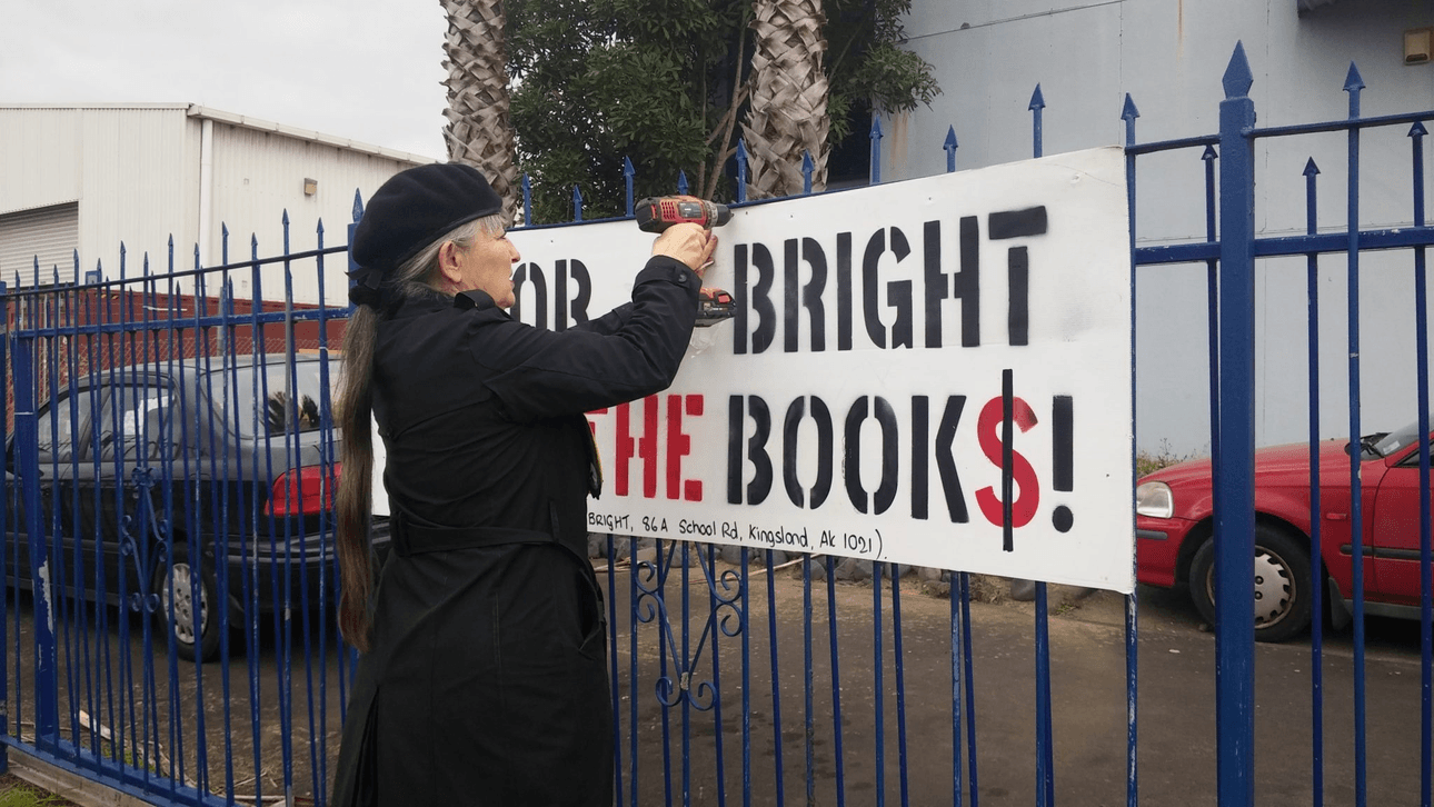 Mayoral candidate Penny Bright picks a fight with struggling signboard. 
