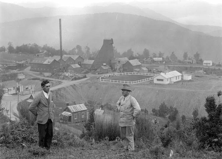 Photographer Joseph Divis (right) and friend above Waiuta. 