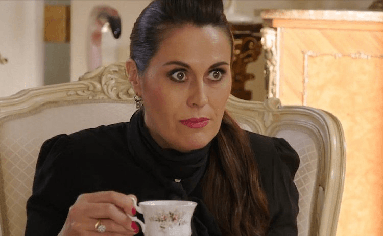 Angela having a big sip of IDGAF