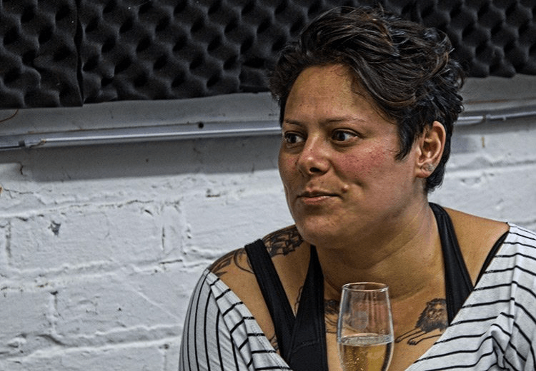 Anika Moa trying to not to burp or worse, probably.