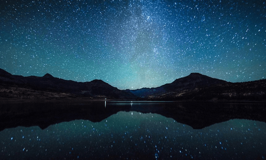 Milky way in the sky with Silhouette mountain. at William’s lake colorado 
