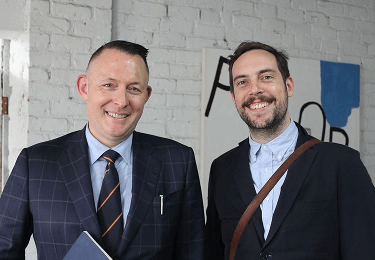 Host and interview guest caught in a web of fear created by intense staff photograpgher