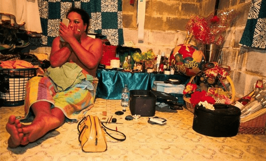 SAMOA - JANUARY 01: The Transformation Island: The fa'afafines of the Samoa islands in Apia, Samoa in 2005-Blondie putting make-up on in her room before going out to party in town. (Photo by Olivier CHOUCHANA/Gamma-Rapho via Getty Images)