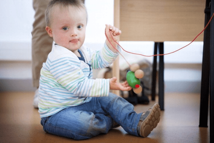 A French boy with Down Syndrome spending a day undergoing tests for a research programme. (Photo: BSIP/UIG via Getty Images)