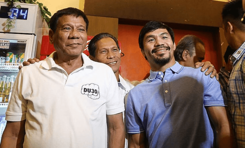 Philippines' President Rodrigo Duterte with boxing icon and newly elected Senator Manny Pacquiao, May 28, 2016. (Photo: MANMAN DEJETO/AFP/Getty Images)