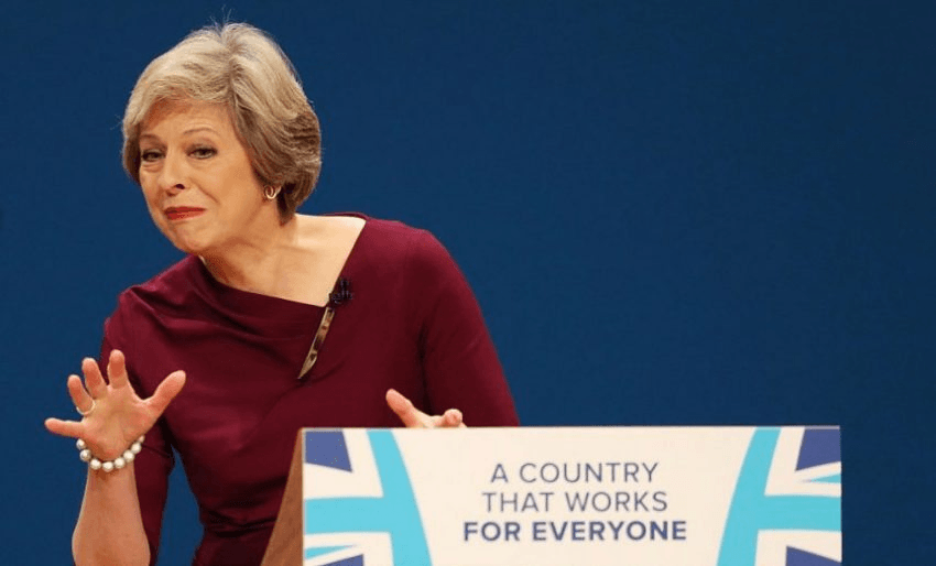 May Theresa May delivers a speech during the fourth day of the Conservative Party Conference 2016 at the ICC Birmingham on October 5, 2016 in Birmingham, England. In her first speech to conference as Prime Minister Theresa May is expected to reach out to the centre ground and try to appeal traditional Labour voters. (Photo by Matt Cardy/Getty Images)