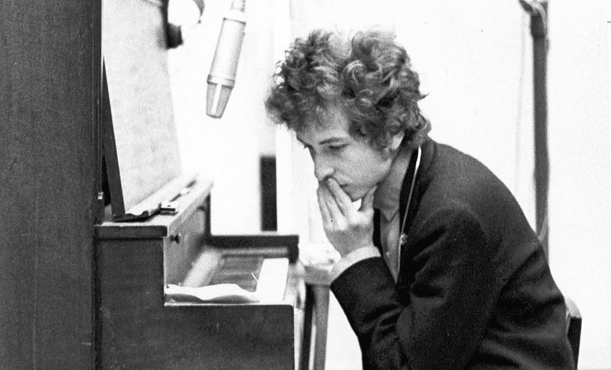 NEW YORK – 1965: Bob Dylan sits at the piano during the recording of the album ‘Highway 61 Revisited’ in Columbia’s Studio A in the summer of 1965 in New York City, New York. (Photo by Michael Ochs Archives/Getty Images) 
