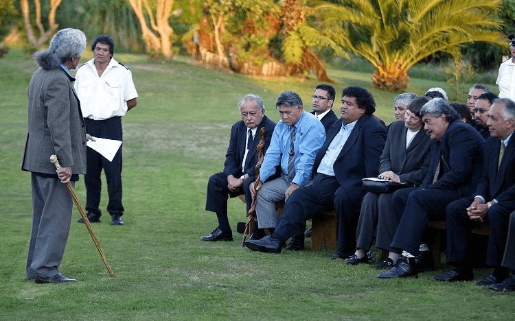 NEW ZEALAND - APRIL 16: A Maori Elder reads a list of grievances to Prime Minister Helen Clark during her visit to Parihaka Marae. (Photo by Rob Tucker/Getty Images)