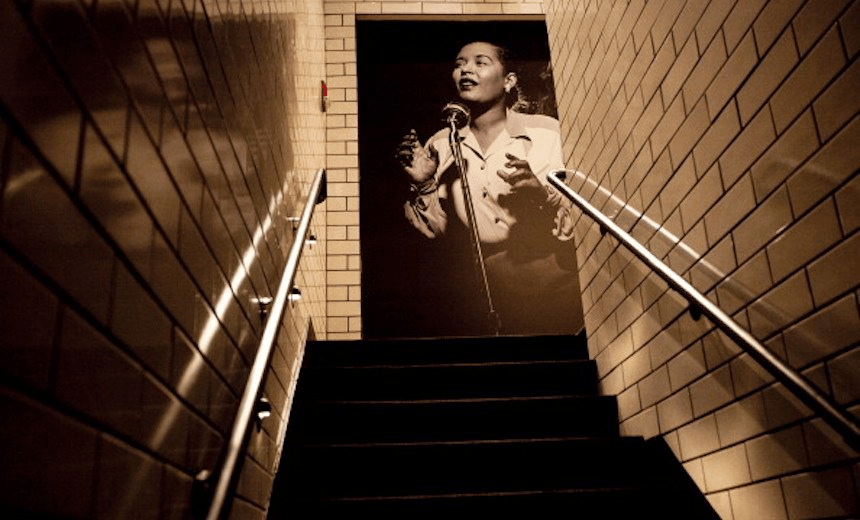 A photo of Billie Holiday at the entrance of Storyville nightclub in Boston, Mass. Photo by Yoon S. Byun/The Boston Globe via Getty Images 
