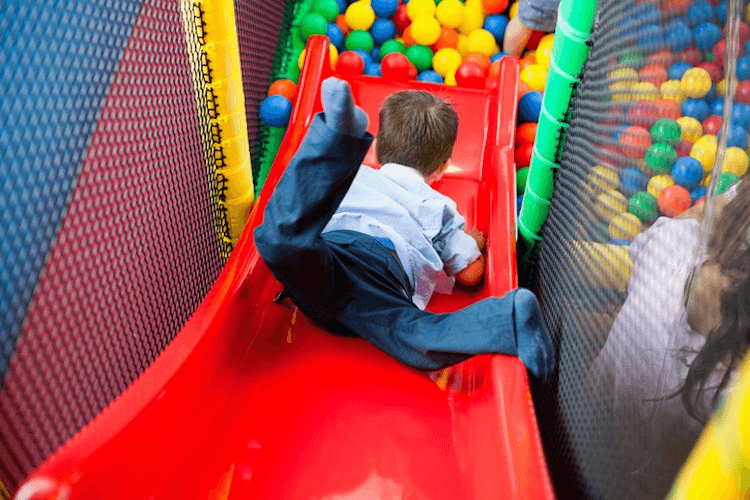 Naughty kid playing in the playground