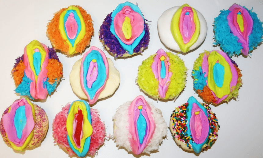 Cupcakes decorated with colourful female genitalia. Photo: Melanie Dawn Harter / Getty Images 
