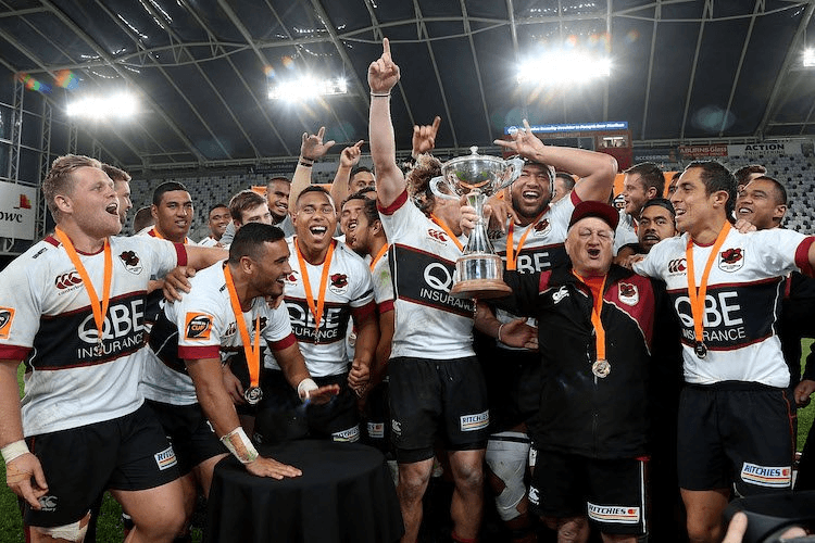 North Harbour players celebrate for the first time since winning the 1987 NPC second division. (Photo by Dianne Manson/Getty Images)