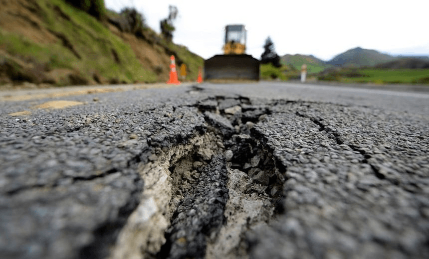 HANMER SPRINGS, NEW ZEALAND – NOVEMBER 14: Large cracks are seen on Highway 7 following a 7.5 magnitude earthquake on November 14, 2016 near Hanmer Springs, New Zealand. The 7.5 magnitude earthquake struck 20km south-east of Hanmer Springs at 12.02am and triggered tsunami warnings for many coastal areas. (Photo by Matias Delacroix/Getty Images) 
