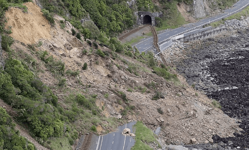 This aerial photo taken and received on November 14, 2016 shows earthquake damage to State Highway One near Ohau Point on the South Island's east coast. A powerful 7.8-magnitude earthquake killed two people and caused massive infrastructure damage in New Zealand, but officials said on November 14 they were optimistic the death toll would not rise further. The jolt, one of the most powerful ever recorded in the quake-prone South Pacific nation, hit just after midnight near the South Island coastal town of Kaikoura. / AFP / POOL / Mark MITCHELL (Photo credit should read MARK MITCHELL/AFP/Getty Images)