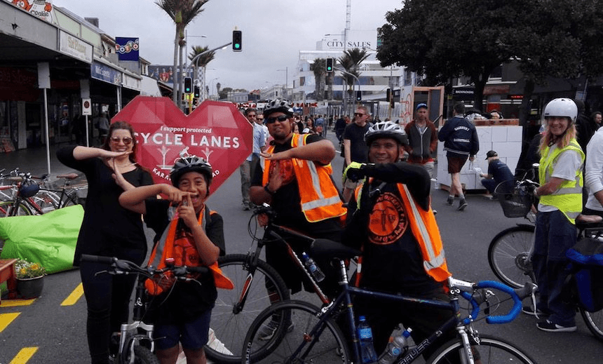 Teau Aiturau (centre) and some members of Mangere BikeFit, who biked all the way from Mangere to town for the K Road Open Streets day in May this year. Photo: Bike Auckland
