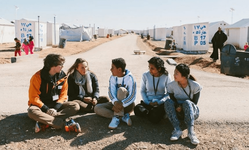Jay Adams, with 16-year-old Syrian refugee Hussam Alheraky, at the Azraq refugee camp in Jordan