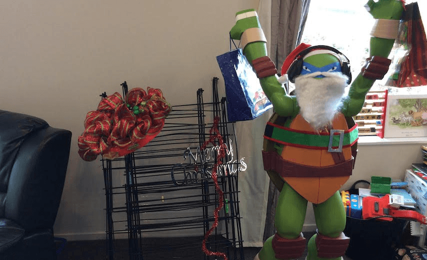 Humage Ginger Turdel Santa and the clothes rack Christmas tree.  
