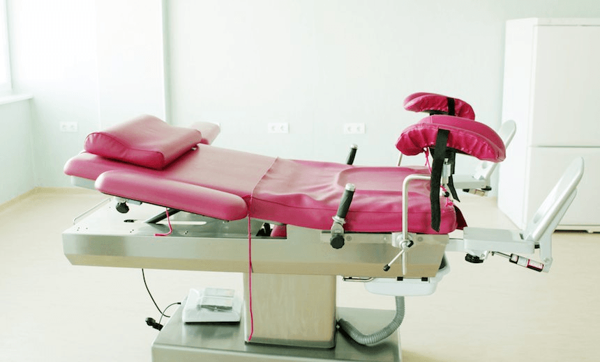 Gynecological chair in gynecological room