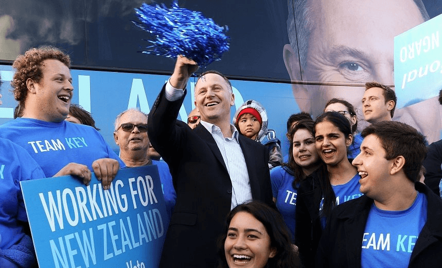 AUCKLAND, NEW ZEALAND – SEPTEMBER 19:  Prime Minister John Key enjoys a laugh with supporters during the National Party Bus Trip at Pak N Save Lincoln North on September 19, 2014 in Auckland, New Zealand. The New Zealand general election will be held Saturday, September 20.  (Photo by Hagen Hopkins/Getty Images) 
