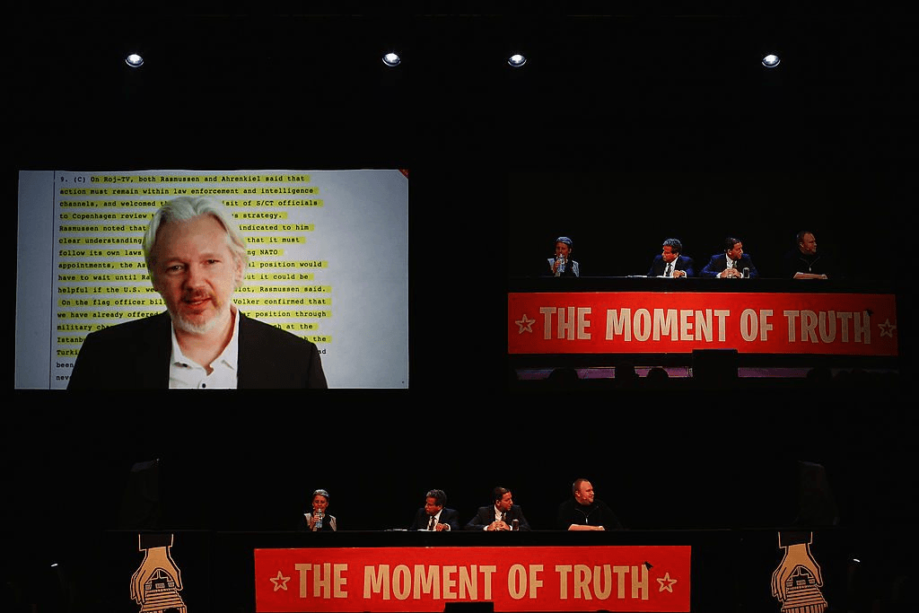 AUCKLAND, NEW ZEALAND - SEPTEMBER 15: Julian Assange, Internet Party leader Laila Harre, Robert Amsterdam, Glenn Greenwald and Kim Dotcom discuss the revelations about New Zealand's mass surveillance at Auckland Town Hall on September 15, 2014 in Auckland, New Zealand. The general election in New Zealand will be held this weekend, on 20 September 2014. (Photo by Hannah Peters/Getty Images)