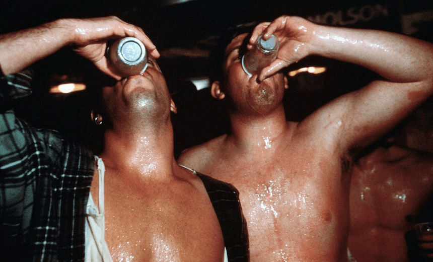 Two Men Binge Drinking at a Party (Photo: Andrew Lichtenstein/CORBIS via Getty Images) 
